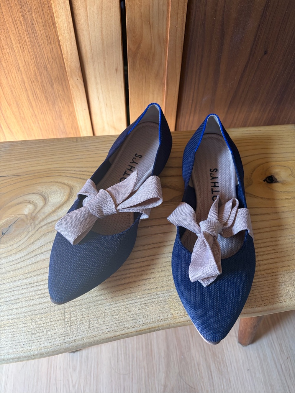 Rothy's Navy Pointed Flats with Beige Bow